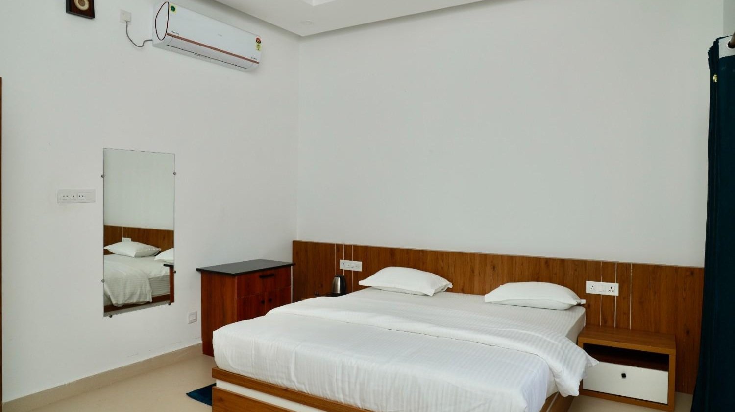 Cozy bedroom interior at Seetharkundu Resorts hill retreat Palakkad Kerala